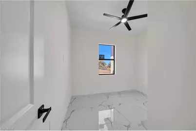 2715 59th St W, Lehigh Acres, FL 33971 - Photo 23