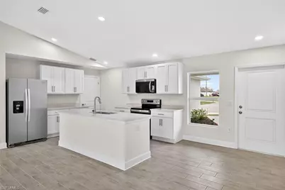 1410 NW 13th Ter, Cape Coral, FL 33993 - Photo 11
