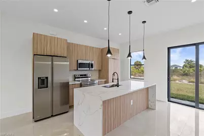 1097 Eisenhower Blvd, Lehigh Acres, FL 33974 - Photo 7