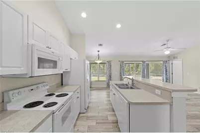 2613 53rd St W, Lehigh Acres, FL 33971 - Photo 13