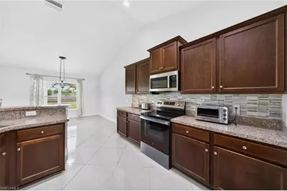 533 Willowbrook Dr, Lehigh Acres, FL 33972 - Photo 13