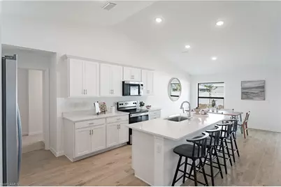 1125 NW Juanita Pl, Cape Coral, FL 33993 - Photo 3