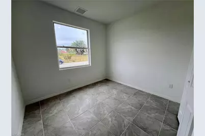 628 Falls Ln, Lehigh Acres, FL 33974 - Photo 31