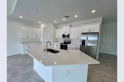 628 Falls Ln, Lehigh Acres, FL 33974 - Photo 15