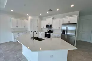 628 Falls Ln, Lehigh Acres, FL 33974 - Photo 15