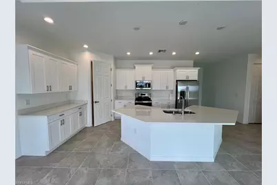 630 Falls Ln, Lehigh Acres, FL 33974 - Photo 15