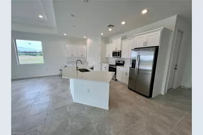 630 Falls Ln, Lehigh Acres, FL 33974 - Photo 17