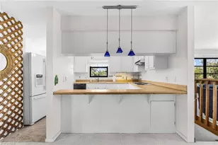 8677 Whispering Pines Dr, Saint James City, FL 33956 - Photo 9