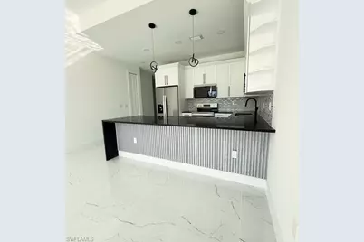 209-211 W 12th St, Lehigh Acres, FL 33972 - Photo 9