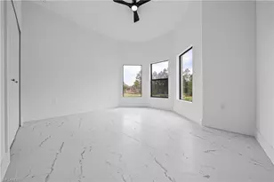 875 Asher St E, Lehigh Acres, FL 33974 - Photo 11