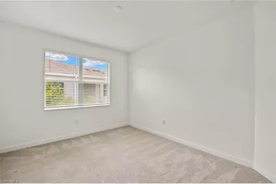 9077 Leatherwood Loop, Lehigh Acres, FL 33936 - Photo 13