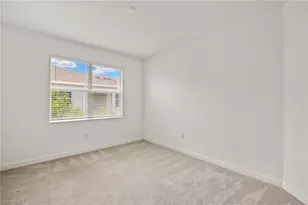 9077 Leatherwood Loop, Lehigh Acres, FL 33936 - Photo 13