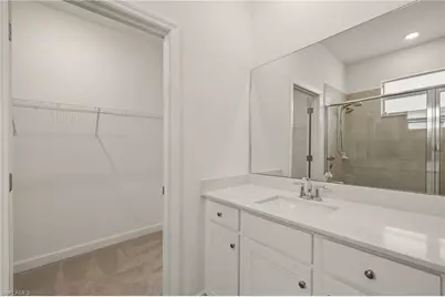 9077 Leatherwood Loop, Lehigh Acres, FL 33936 - Photo 19