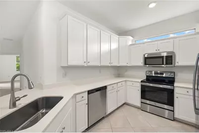 9077 Leatherwood Loop, Lehigh Acres, FL 33936 - Photo 11