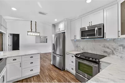 1828 SW 18th Ter, Cape Coral, FL 33991 - Photo 11