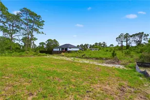 1018 Kent St E, Lehigh Acres, FL 33971 - Photo 27