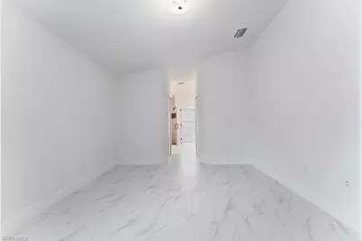 1042 Cheney Ave S, Lehigh Acres, FL 33974 - Photo 15