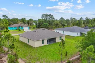 1042 Cheney Ave S, Lehigh Acres, FL 33974 - Photo 35