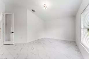 1042 Cheney Ave S, Lehigh Acres, FL 33974 - Photo 21