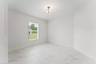 1042 Cheney Ave S, Lehigh Acres, FL 33974 - Photo 23