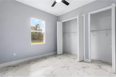 2818 42nd St SW, Lehigh Acres, FL 33976 - Photo 33