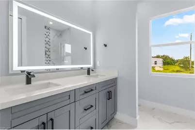 2818 42nd St SW, Lehigh Acres, FL 33976 - Photo 27