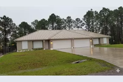 385/387 Carrillon Ave S, Lehigh Acres, FL 33974 - Photo 1