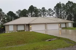 385/387 Carrillon Ave S, Lehigh Acres, FL 33974 - Photo 1