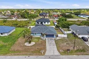 906 Venice Ave N, Lehigh Acres, FL 33971 - Photo 3