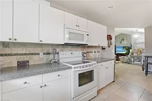 906 Venice Ave N, Lehigh Acres, FL 33971 - Photo 17