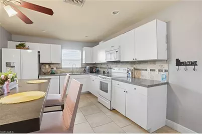 906 Venice Ave N, Lehigh Acres, FL 33971 - Photo 15