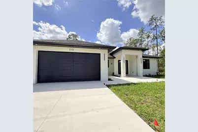2102 E 13th St, Lehigh Acres, FL 33972 - Photo 1