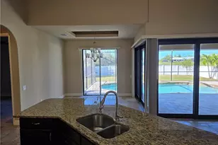 2406 Kismet Lakes Ln, Cape Coral, FL 33993 - Photo 13