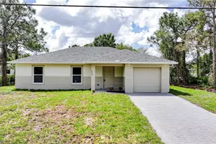 824 Carpenter St E, Lehigh Acres, FL 33974 - Photo 1