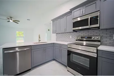 824 Carpenter St E, Lehigh Acres, FL 33974 - Photo 3