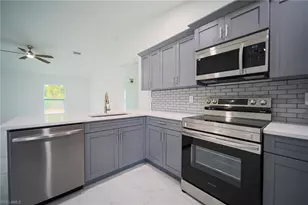 824 Carpenter St E, Lehigh Acres, FL 33974 - Photo 3