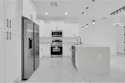 3312 33rd St W, Lehigh Acres, FL 33971 - Photo 13