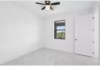 3008 62nd St W, Lehigh Acres, FL 33971 - Photo 25