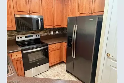 8585 Athena Ct, Lehigh Acres, FL 33971 - Photo 7