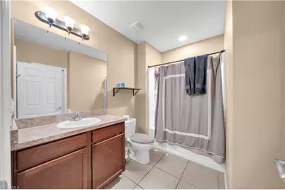 10549 Canal Brook Ln, Lehigh Acres, FL 33936 - Photo 23