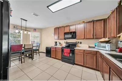 10549 Canal Brook Ln, Lehigh Acres, FL 33936 - Photo 7