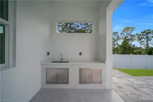 2703 34th St SW, Lehigh Acres, FL 33976 - Photo 41