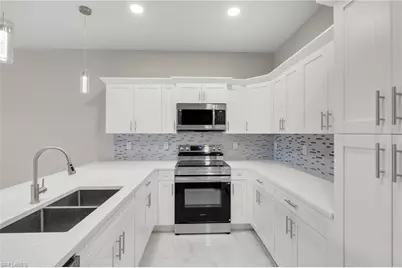 917 Margaret Ave S, Lehigh Acres, FL 33974 - Photo 5