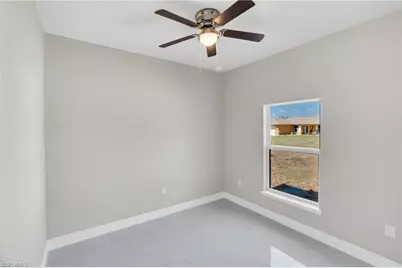 917 Margaret Ave S, Lehigh Acres, FL 33974 - Photo 9