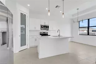411 NE 7th Terrace, Cape Coral, FL 33909 - Photo 5