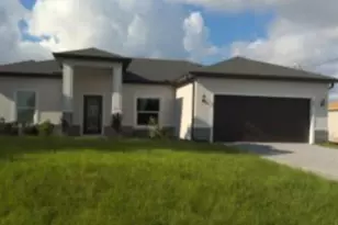 28 NW 26th St, Cape Coral, FL 33993 - Photo 1