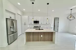 2706 Floyd Ave S, Lehigh Acres, FL 33976 - Photo 9