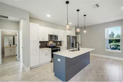 421 NE 19th Ter, Cape Coral, FL 33909 - Photo 13