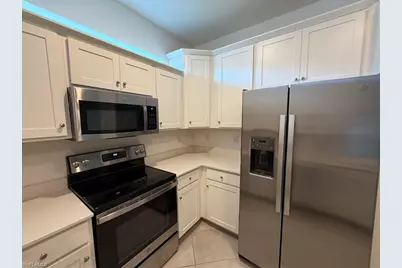 9077 Leatherwood Loop, Lehigh Acres, FL 33936 - Photo 15