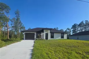 457 Woodman Dr, Lehigh Acres, FL 33972 - Photo 1